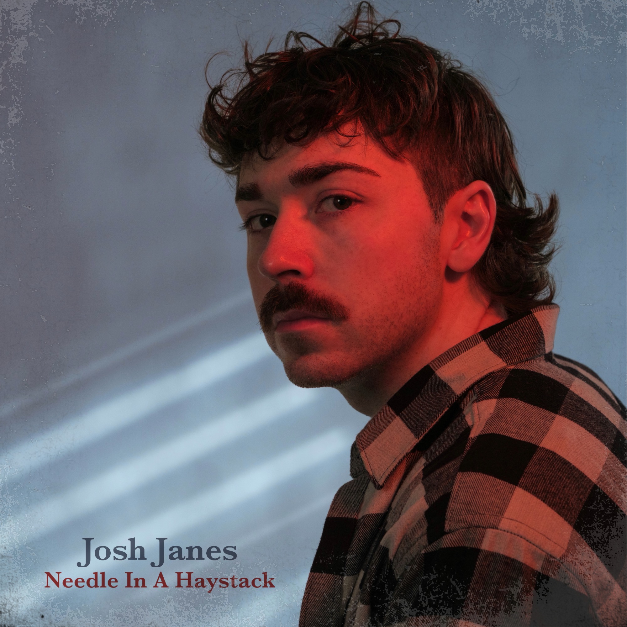 Needle In A Haystack EP cover — Josh Janes lit in red against a blue wall