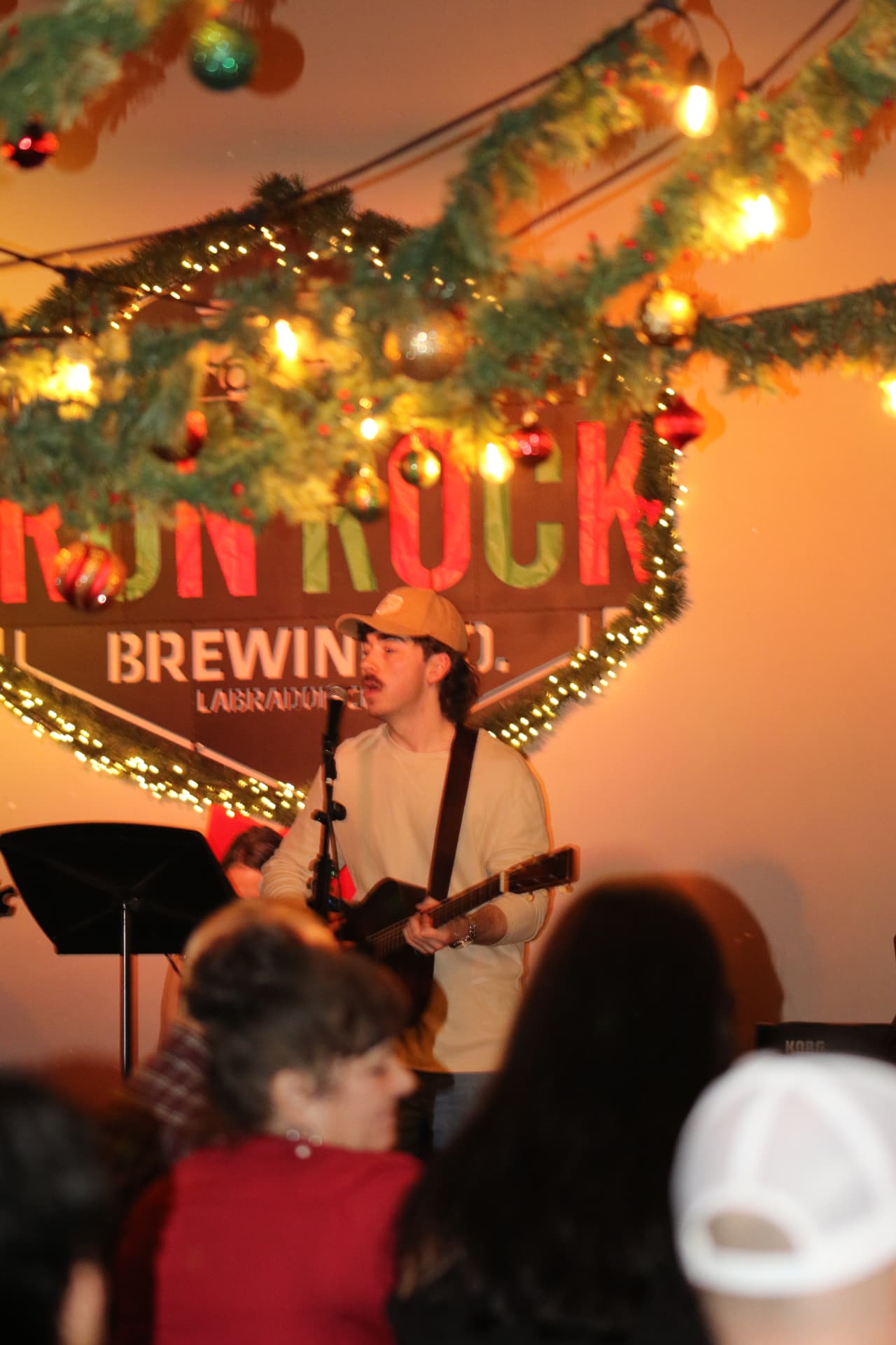 Josh Janes playing a Christmas show at Iron Rock Brewing Co in Labrador City